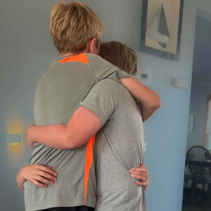 three brothers hugging