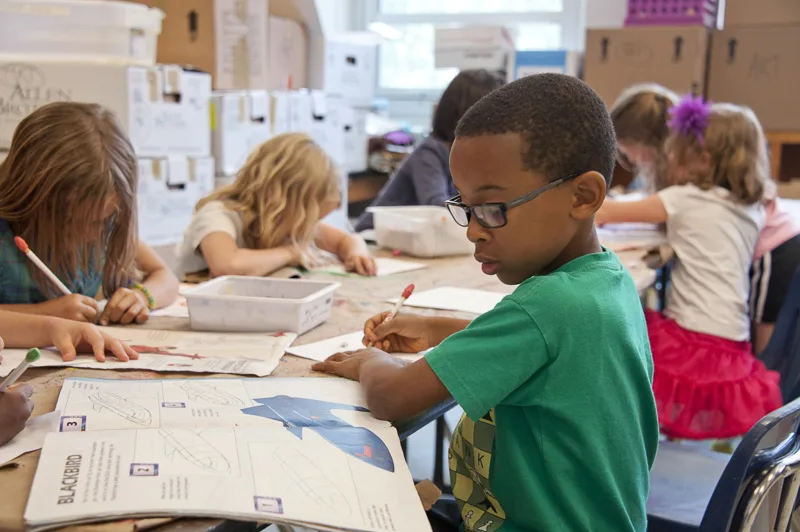 school boy in class